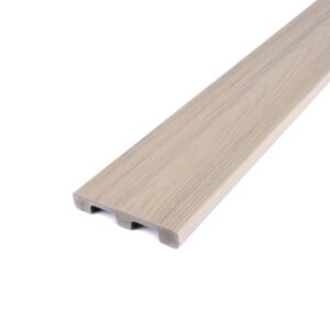 Deckorators Venture Shoreline solid-edge decking board featuring a light beige, sun-washed woodgrain finish and scalloped composite profile, displayed on a white background.