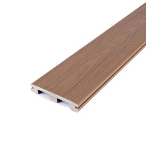 Angled close-up of a Deckorators Altitude grooved-edge board in Sequoia, highlighting its medium brown tone and realistic wood-grain finish. The scalloped profile provides a lighter weight while maintaining strength and fire-resistant performance.