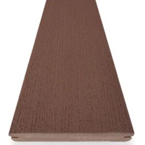 Close-up view of a TimberTech Premier Dark Teak composite decking board with grooved edges, highlighting the deep brown color, subtle grain pattern, and scalloped underside.