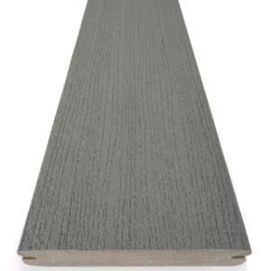 Single grooved-edge board of TimberTech Prime Maritime Gray composite decking shown against a white background. The board has a cool-toned medium gray surface with low-contrast streaking and a fine wood grain texture. Designed for durability and moisture resistance, this capped board features clean, straight edges and a natural finish that mimics brushed wood.
