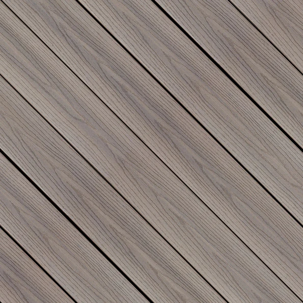 This swatch shows Fiberon Good Life Cabana, a light taupe-gray decking color with understated, linear woodgrain texture. Soft beige and gray undertones blend together to create a driftwood-inspired look. The finish feels airy, versatile, and bright, suited for breezy, coastal-style decks.