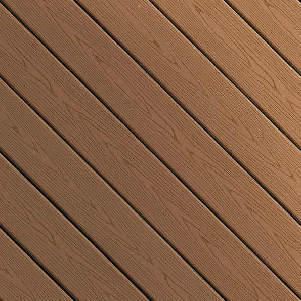 This swatch displays Fiberon Good Life Cabin, a medium brown solid decking tone with consistent coloring and subtle woodgrain embossing. The hue resembles a freshly stained pine board, warm and traditional. Its even coloring creates a clean, classic appearance across the deck surface.