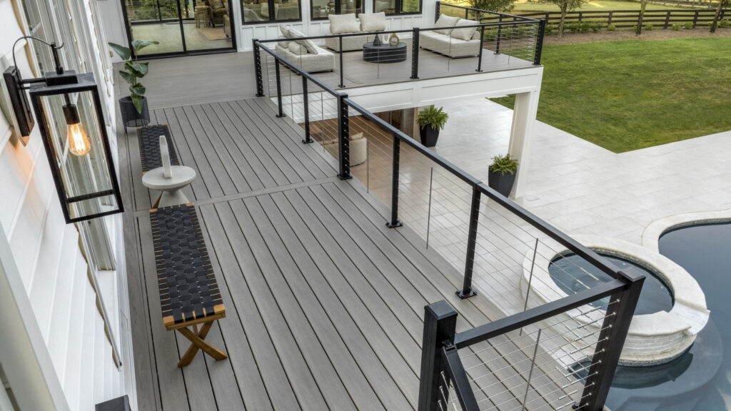 Modern home deck with Trex Signature horizontal cable railing, contemporary outdoor design inspiration.