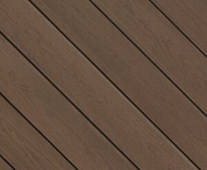 Envision Expression decking swatch in Caribou Brown – classic mid-brown boards featuring natural grain details.