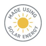 A round emblem featuring a yellow sun in the center with the words “Made Using Solar Energy” curving around the border. This symbol indicates that Eva-Last Eclipse is manufactured with solar-powered processes, reinforcing its commitment to sustainability. It emphasizes the eco-friendly nature of the decking line and its reduced environmental impact.