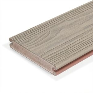 A close-up view of an Eva-Last Eclipse grooved-edge deck board in Shoreline Gray, showing its soft, weathered gray tone and realistic woodgrain texture. The board’s fully capped bamboo-PVC composite core is visible along the edge, highlighting its reinforced structure designed for durability and moisture resistance.