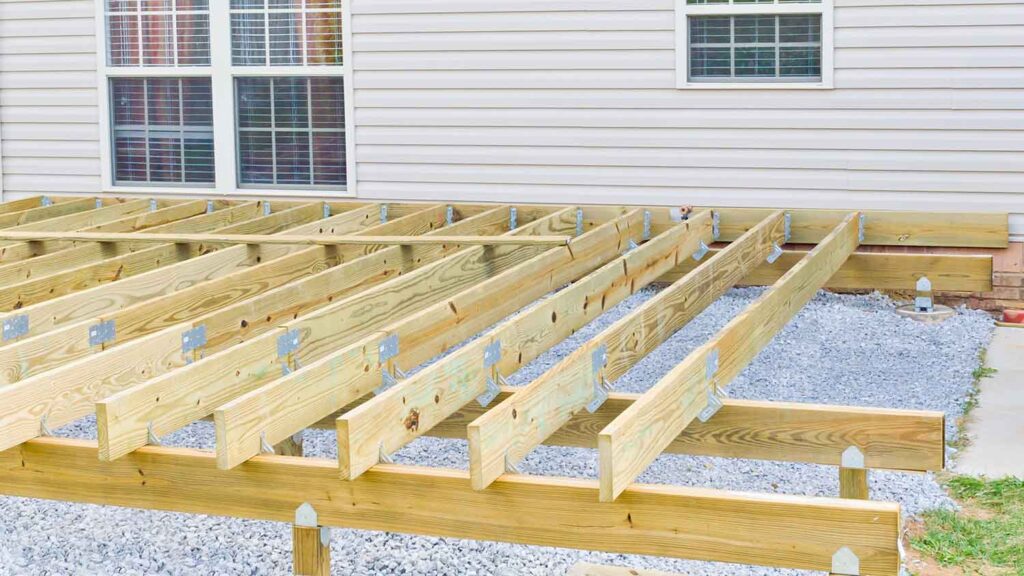 Estimate the maximum joist span between beams or from ledger to beam based on joist size and spacing.