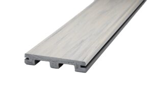 Wolf Haven Wheatfield decking shown as a grooved-edge board with a lightweight scalloped profile, engineered for use with hidden fastening systems. Precision side grooves allow for uniform spacing and a smooth, fastener-free deck surface while preserving the natural wood-inspired appearance.