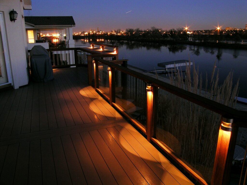 Luxury solid brass and copper HighPoint deck lighting fixtures for premium Gold Coast and Lincoln Park residential builds.