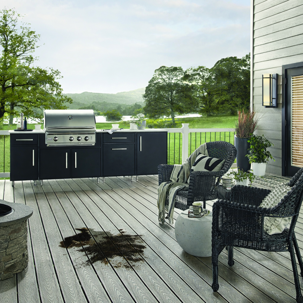 Small grease stain near grill showing need to clean wolf decking properly