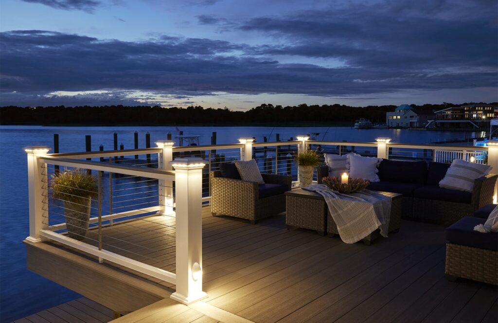 Dimmable low-voltage TimberTech LED post cap lights providing custom ambiance for high-density Chicago city wards.