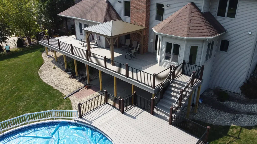 Large elevated backyard deck with gazebo seating area built by Mitchell Construction Custom Decks serving Plainfield IL and surrounding Chicagoland.