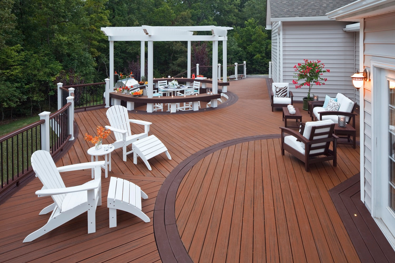 Modern composite poolside deck showcasing Trex decking, ideal for estimating deck cost based on size and material selection