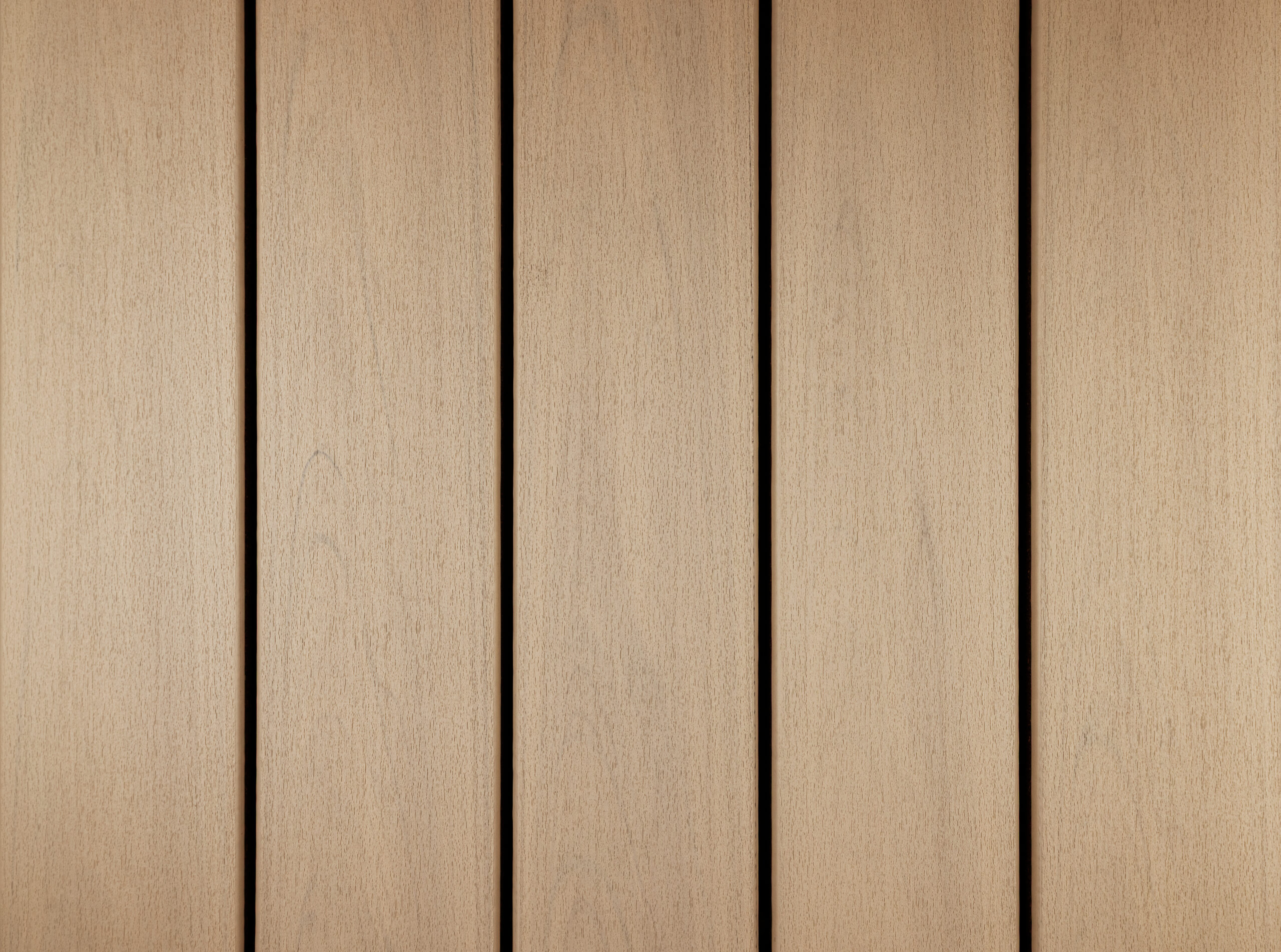 Trex Transcend Lineage composite decking boards in Carmel color displayed in a detailed swatch pattern. The soft brown tone offers a natural wood look designed for long term outdoor durability.