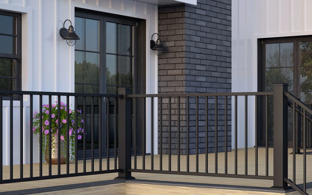 Deckorators aluminum deck railing in black with vertical balusters, offering a durable, low-maintenance solution for modern outdoor deck designs.