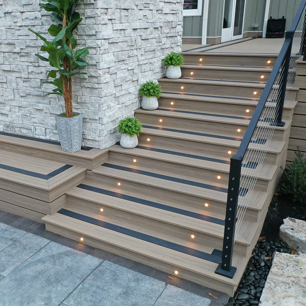 deckorators composite deck with stair lighting
