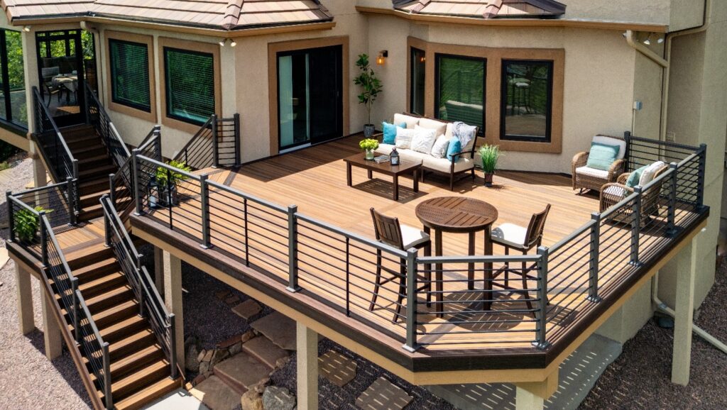 Envision Designer aluminum deck railing with horizontal metal balusters in a dark finish, delivering a modern, low-maintenance railing system for elevated decks.