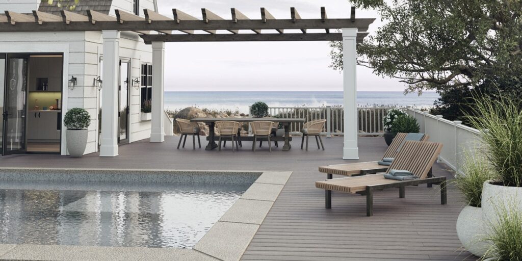 Fiberon ArmorGuard composite deck railing in white with vertical balusters, built for durability, low maintenance, and a clean traditional look.