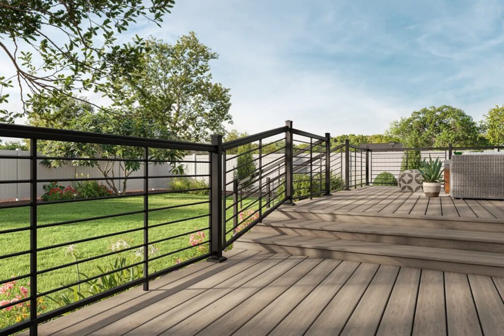 MoistureShield Compass aluminum deck railing with horizontal metal infill installed on a multi-level deck with stairs, creating a modern and low-maintenance outdoor design.