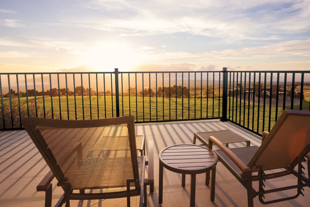 MoistureShield Fathom steel deck railing in black surrounding an outdoor seating area, delivering strong performance, clean lines, and long-lasting durability.