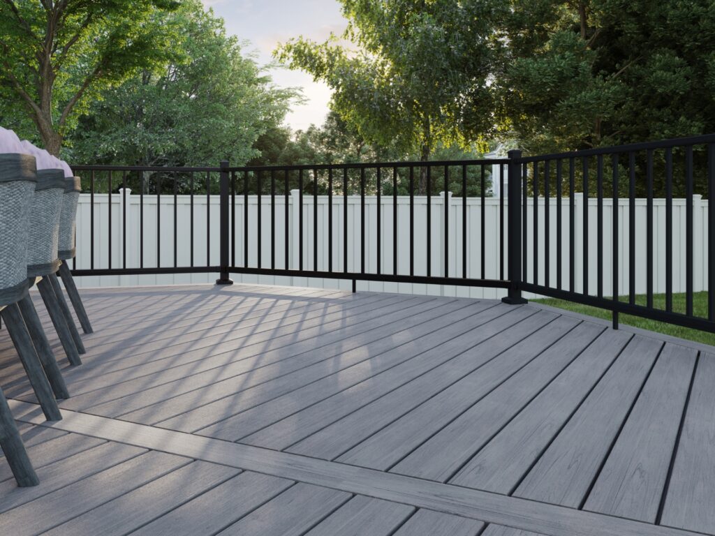 Trex Select aluminum deck railing with black balusters and modern design on residential outdoor deck.