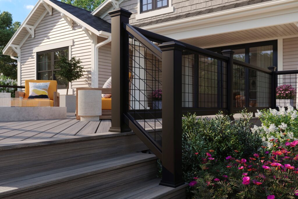 Trex Select mesh deck railing with black aluminum frame and wire infill on modern composite deck.
