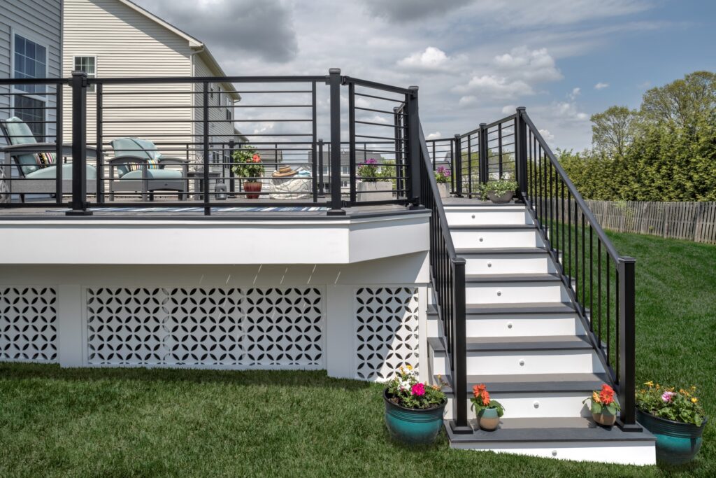 Trex Signature rod rail aluminum deck railing with horizontal metal rods and modern black finish.