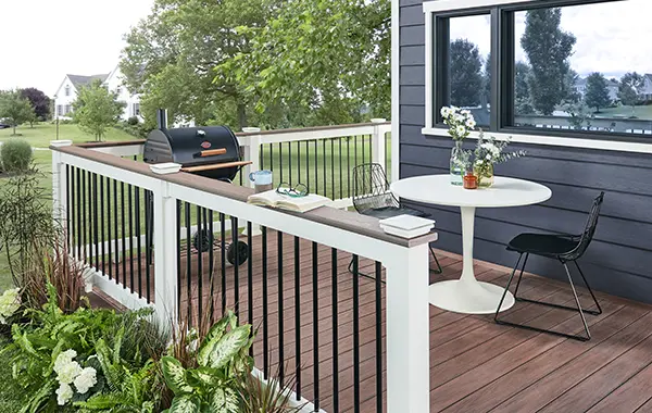 UV-resistant Wolf PVC railing kits installed on a multi-family residential project in Chicago to prevent sun-fade.