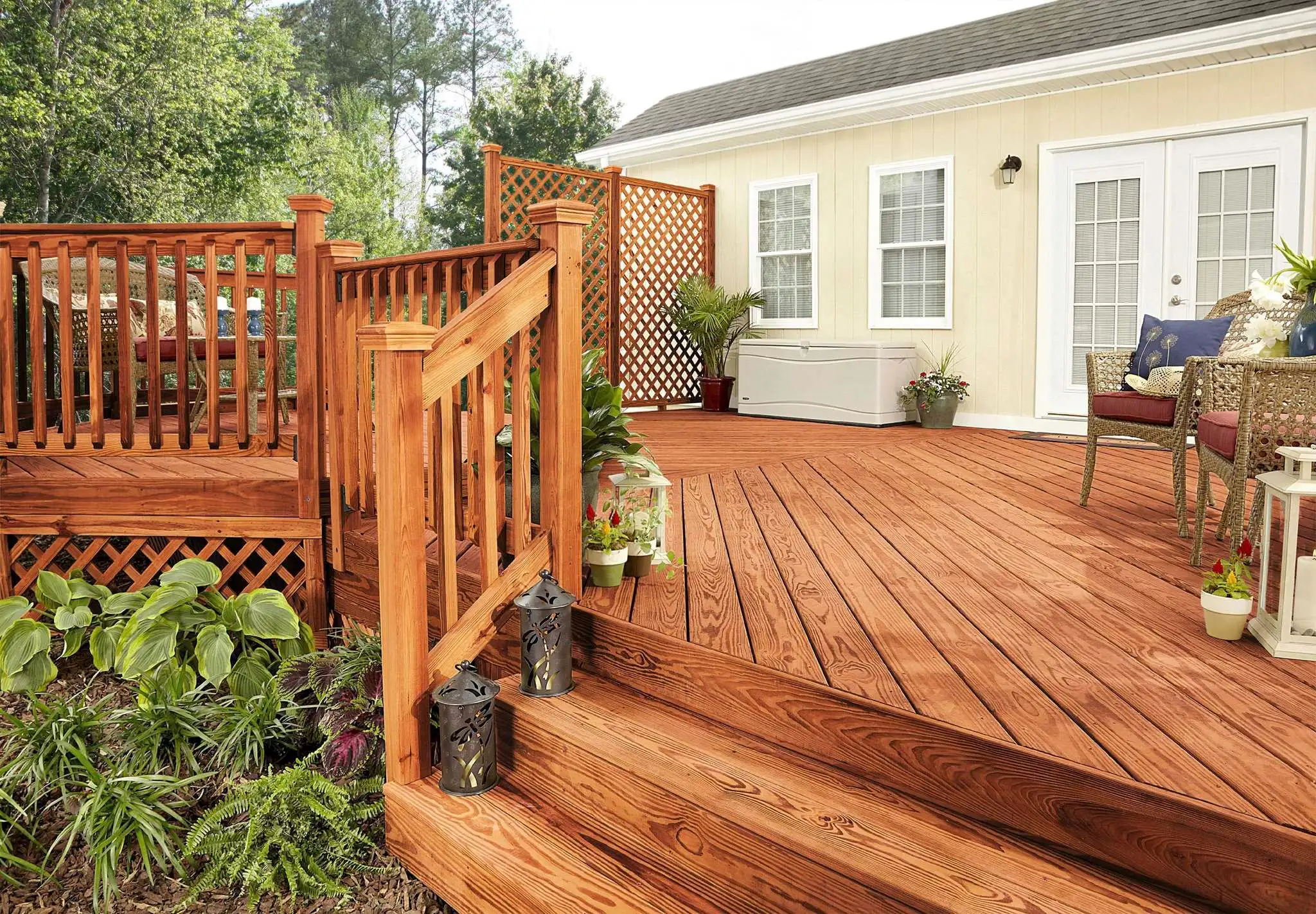 Residential wood deck with stairs and guardrails built to 2024 IRC deck code pressure treated wood requirements