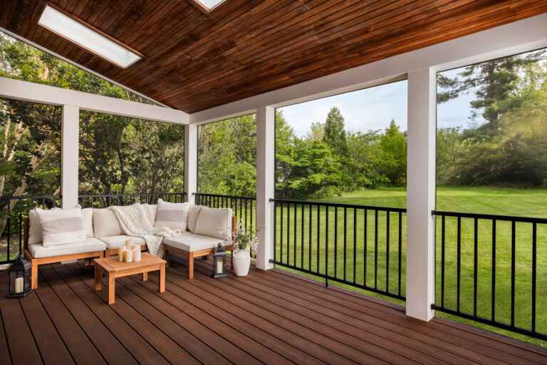 trex enhance decking with a white trim and black railing