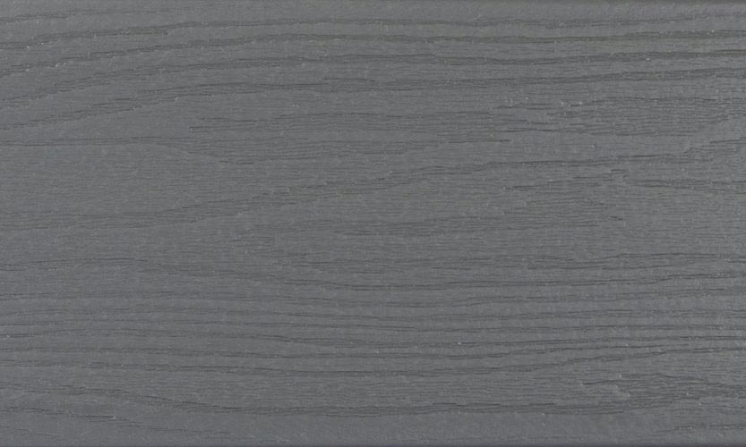 MoistureShield Elevate Lake Fog composite deck board swatch with charcoal gray wood grain
