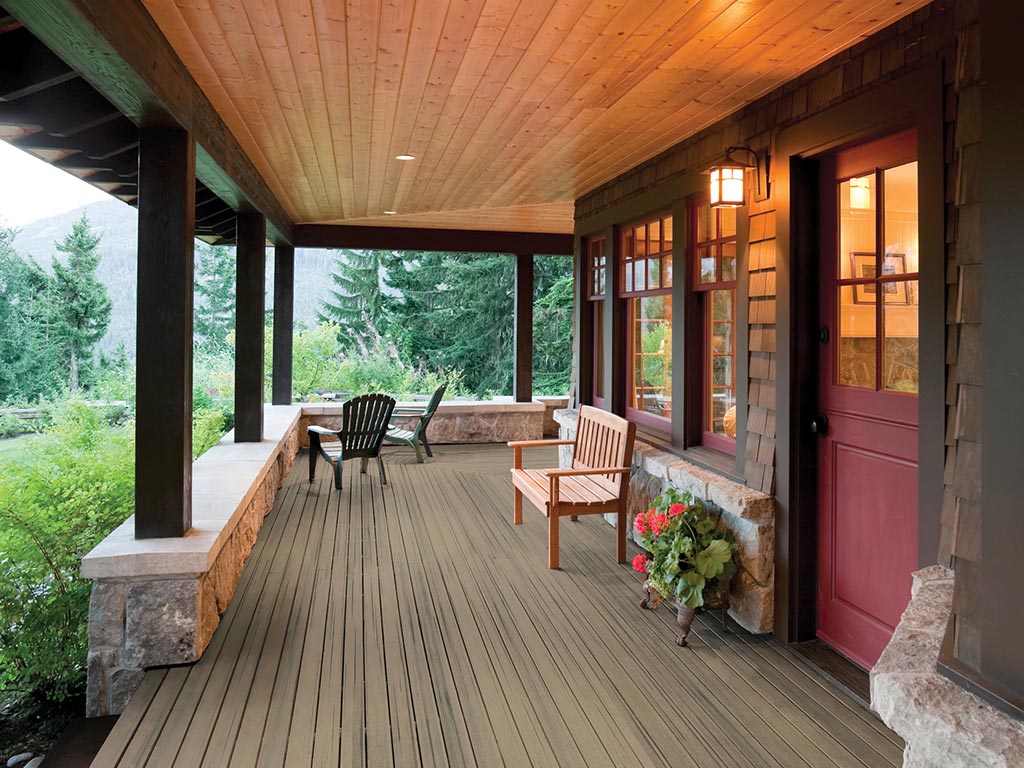 MoistureShield Elevate Riverbank composite deck front porch with mountain view and stone accents