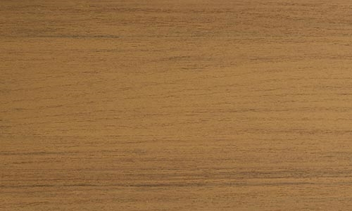 MoistureShield Meridian Shoreside composite deck board swatch with warm golden-brown wood grain