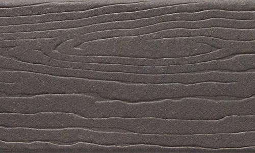 MoistureShield Vantage Cape Cod Gray uncapped composite deck board swatch with rustic gray wood grain texture