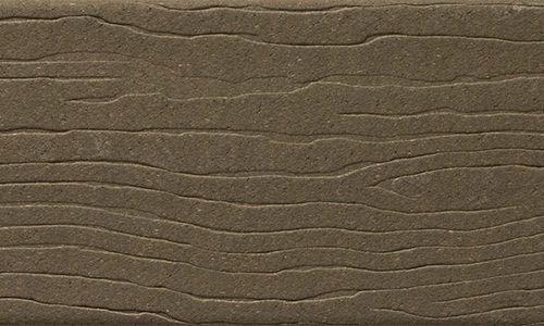 MoistureShield Vantage Earthtone uncapped composite deck board swatch with rustic olive-brown wood grain texture