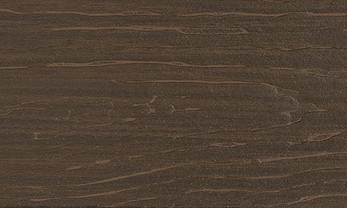 MoistureShield Vision Spanish Leather composite deck board swatch with dark brown wood grain