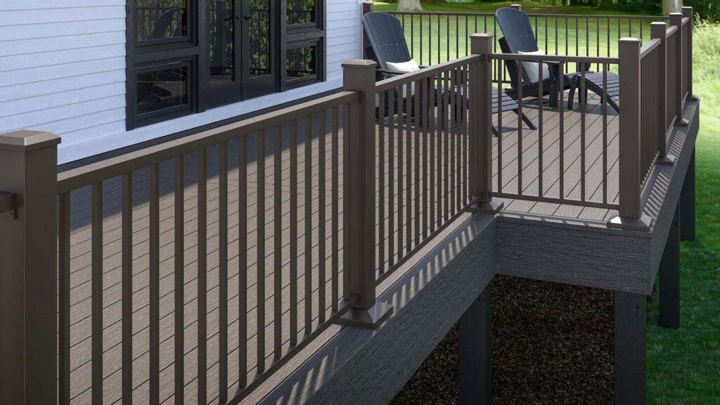 Bronze Deckorators Contemporary Rail with square balusters on a Driftwood Vista composite deck.