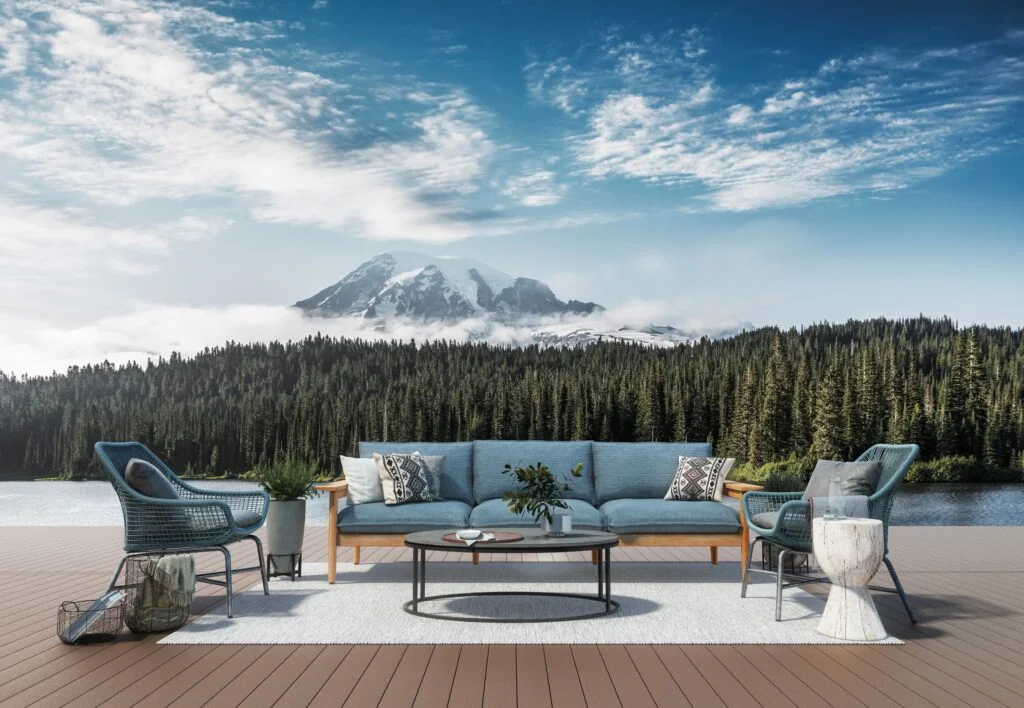 Fiberon composite decking in warm brown on an open deck with mountain views and outdoor seating