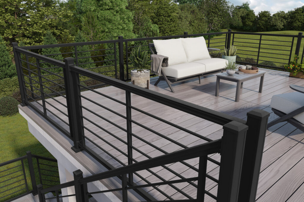 KeyLink American Series railing with horizontal rod infill, a black metal deck railing idea on a tan composite deck.