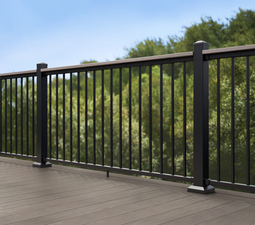 Black TimberTech Fulton Rail with a composite drink rail cap on a gray deck.