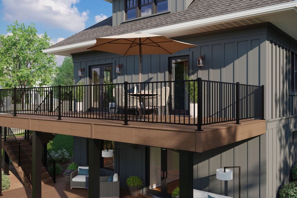 Black Trex Enhance Steel railing around an elevated composite deck against dark board-and-batten siding, black metal deck railing ideas.