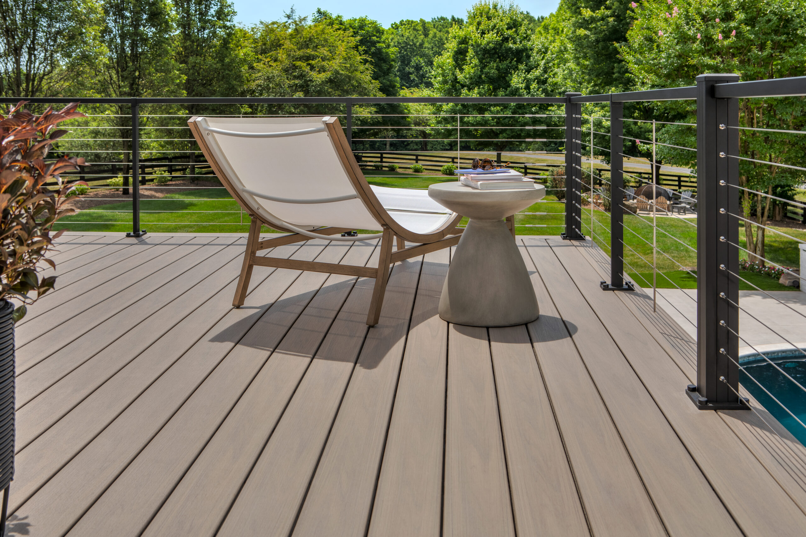 Finished composite deck with consistent gaps between deck boards.