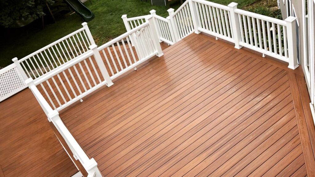 Fiberon deck ideas featuring Good Life Bungalow Decking with White Railing and traditional backyard layout.