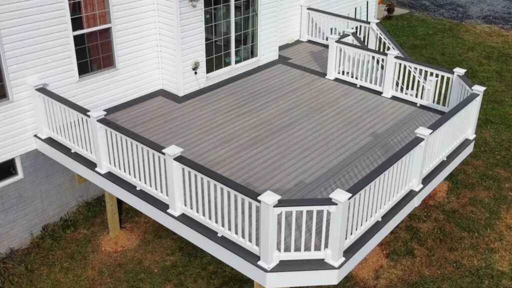 Fiberon Good Life Cabana and Earl Grey two-tone deck with contrasting divider boards and white railing.