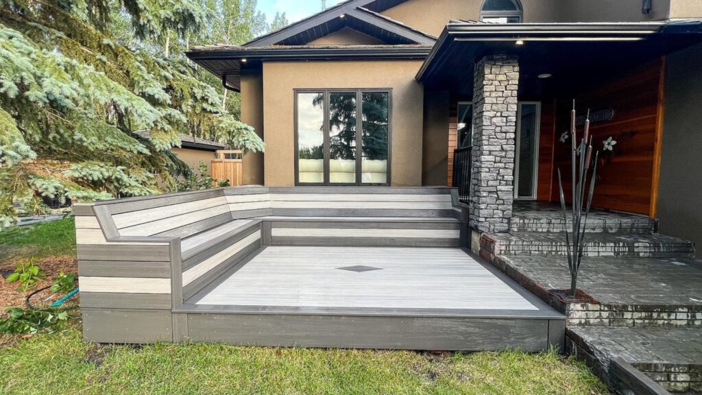 Fiberon Sanctuary Chai and Earl Grey deck with two-tone built-in bench seating and contrasting perimeter trim.