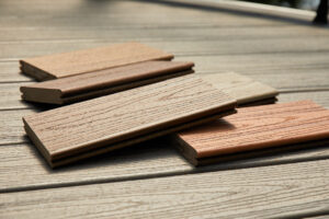 Grooved and square composite deck boards showing different edge profiles