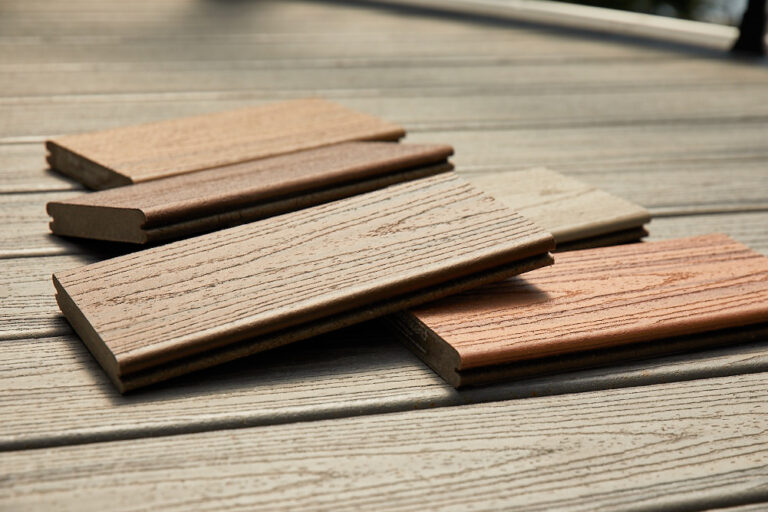 Grooved and square composite deck boards showing different edge profiles